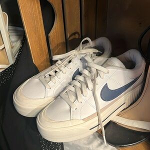 Nike women’s white and navy swish shoes size 7